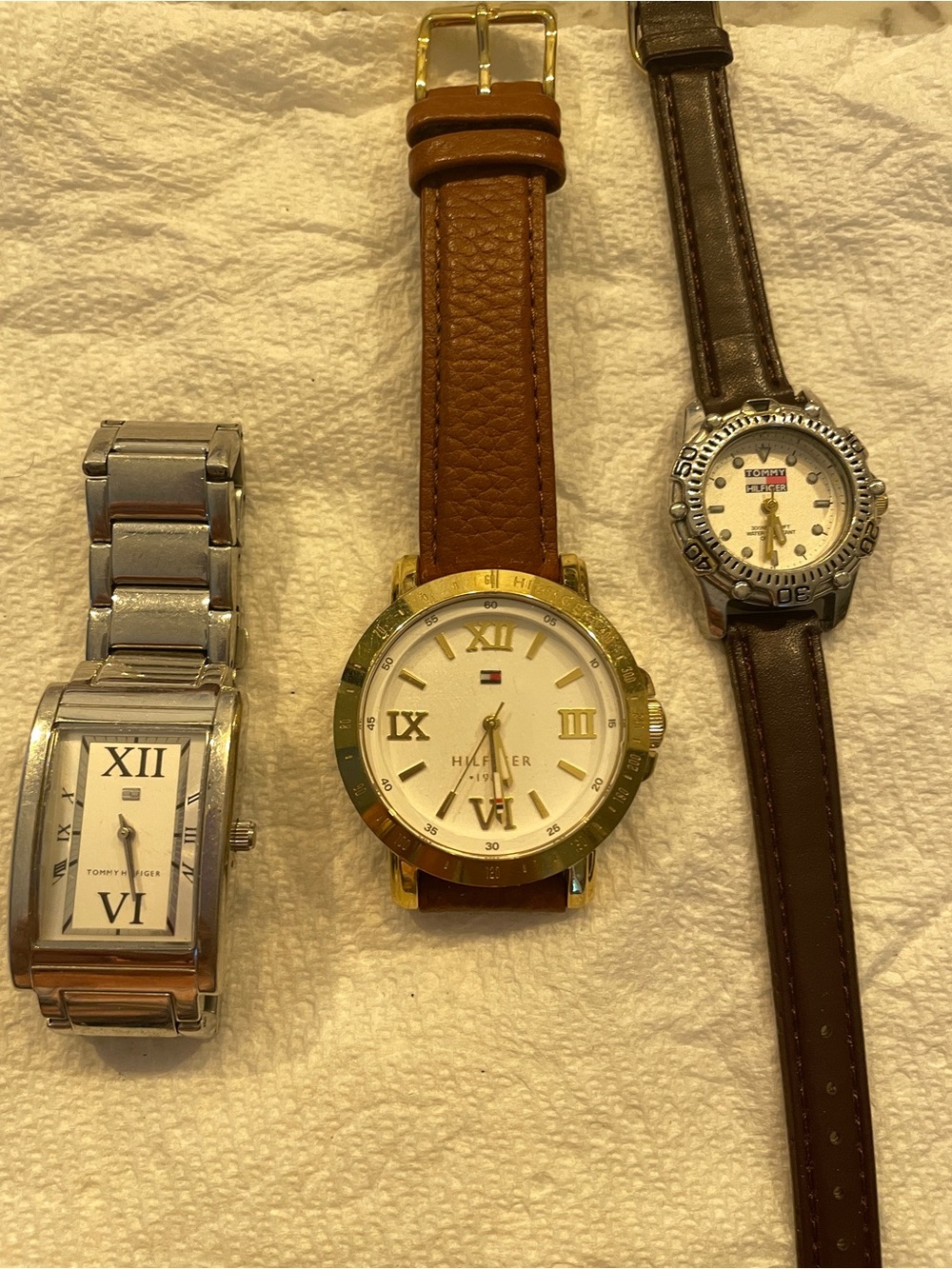 3 Tommy Hilfiger watches. 2 men’s and one womens